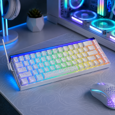 white keyboard in the Hall Effect series sits in a dark gamers room with glowing rainbow lights