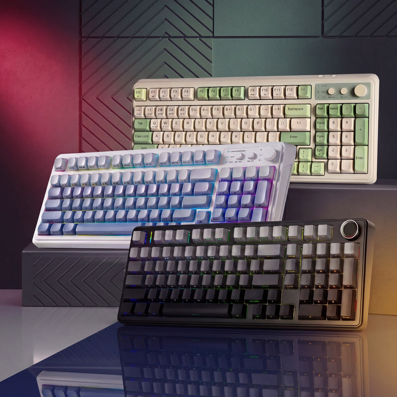 Three mechanical keyboards on a reflective surface with a geometric patterned wall in the background