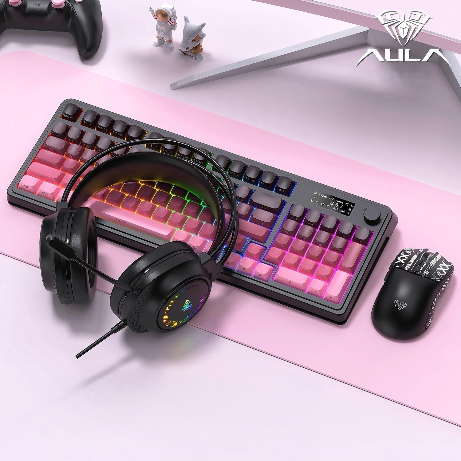 Mechanical keyboard with pink and gray keys on a black keyboard frame